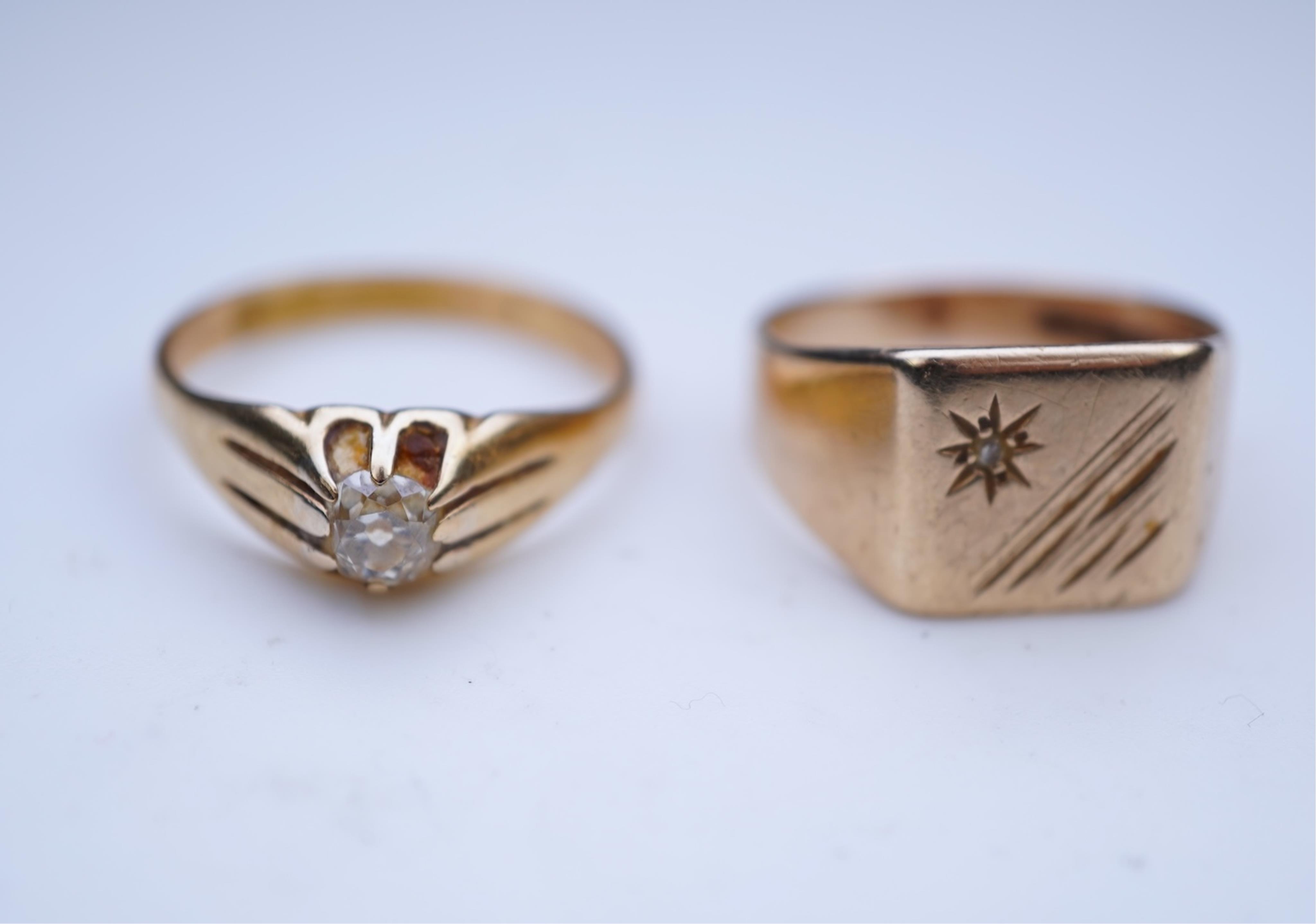 Two gold and diamond rings